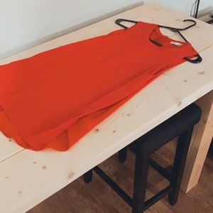 Red sleeveless blouse